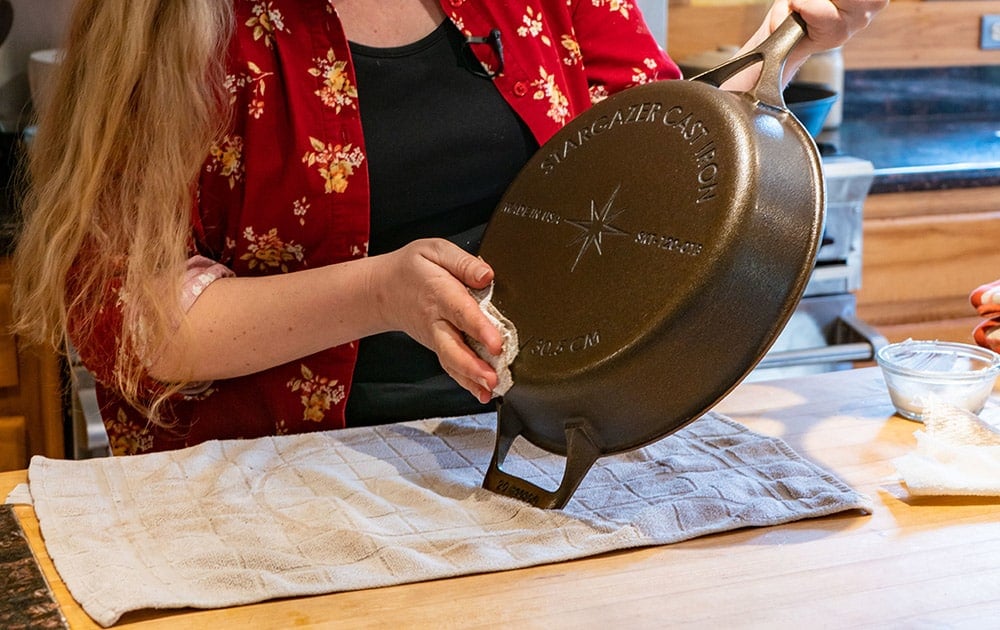 Hello, I recently had a housemate use steel wool to get food off my cast  iron and stripped it. I reseasoned it by rubbing it with veggie oil and  putting it in