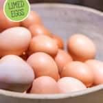 Pinterest pin with a bowl of farm fresh eggs. Text overlay says, "Preserving eggs the old fashioned way".