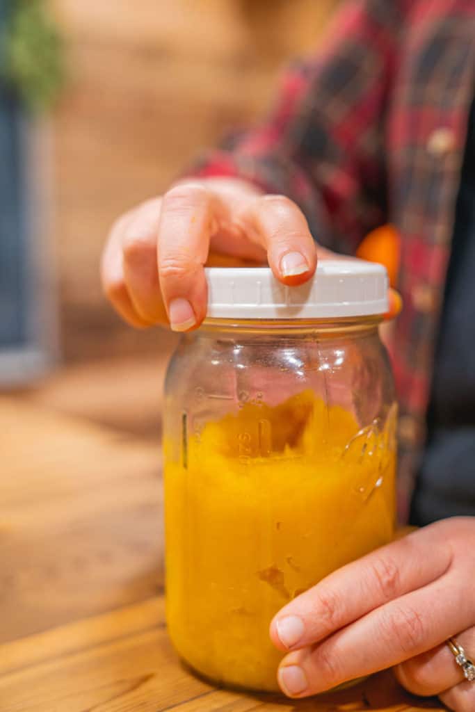 Pumpkin puree in a mason jar with lid.