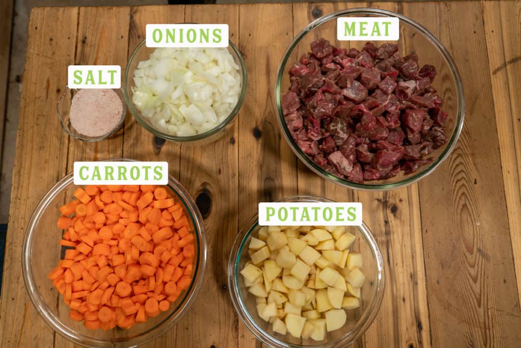 Canned stew ingredients in bowls.