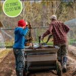 Pinterest pin with an image of two people spreading compost on the garden using a BCS tractor.