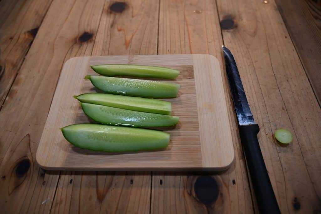 A cucumber sliced into spears.