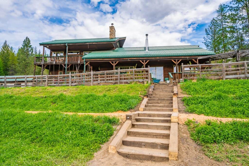 Image of a home with terraced landscaping in front of it.