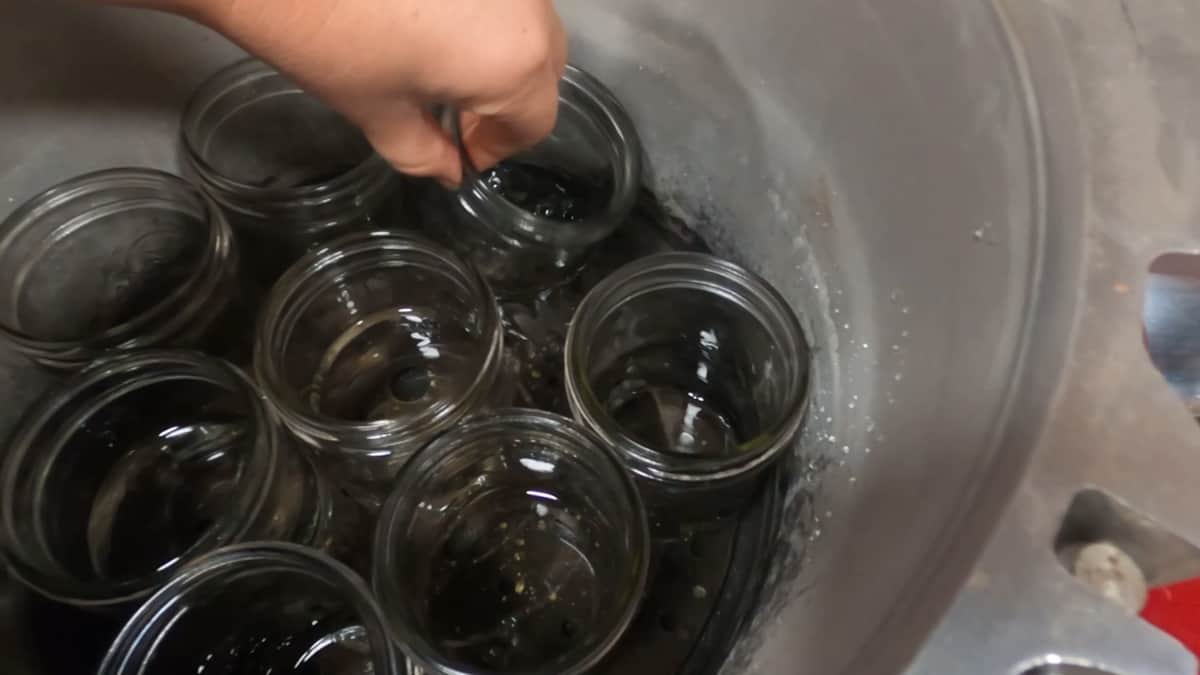 Empty Mason jars in a pressure canner.