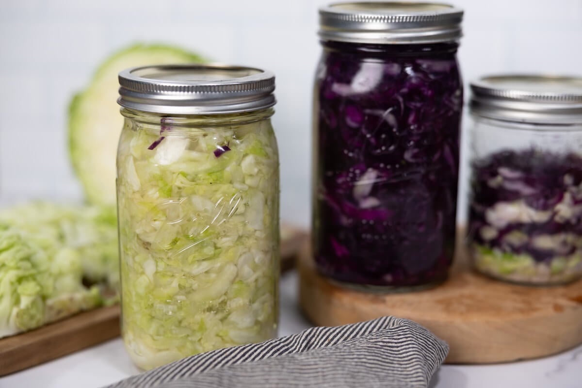 One jar of green and one jar of red fermented sauerkraut.