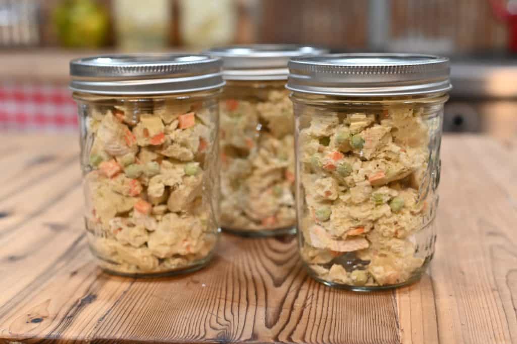 Three jars of freeze-dried chicken pot pie.