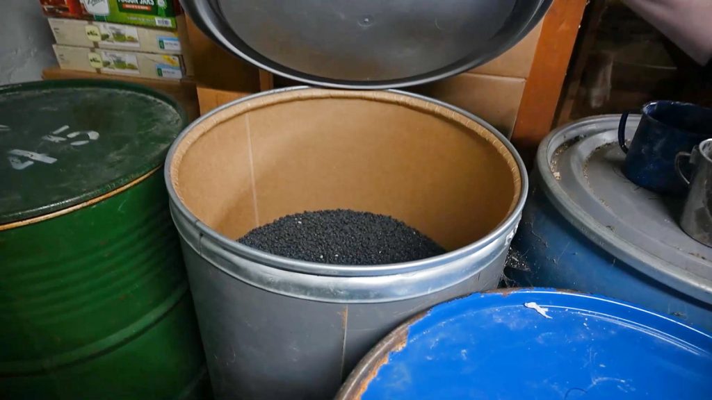 A 55 gallon food barrel of black beans.