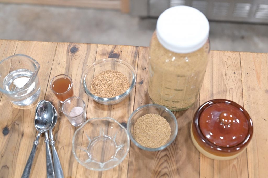 Ingredients needed to make homemade mustard.