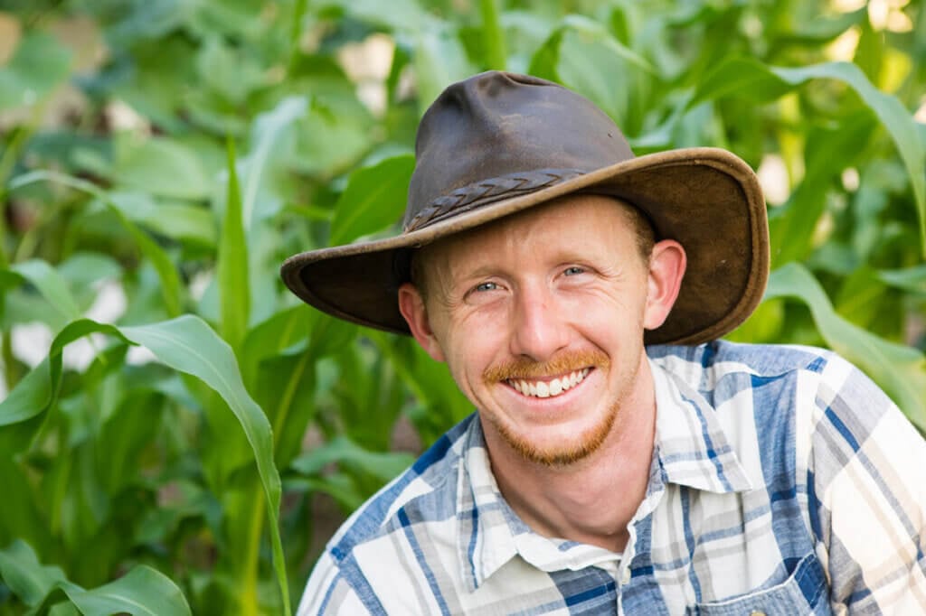 A man in a cowboy hat.