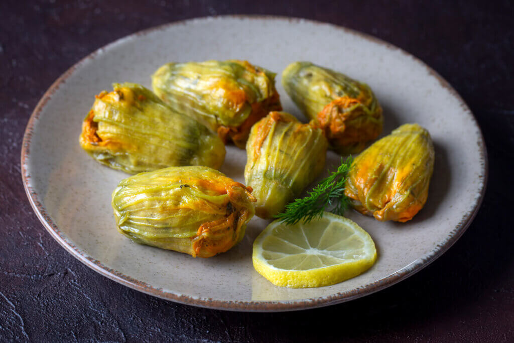 Zucchini blossoms on a plate.