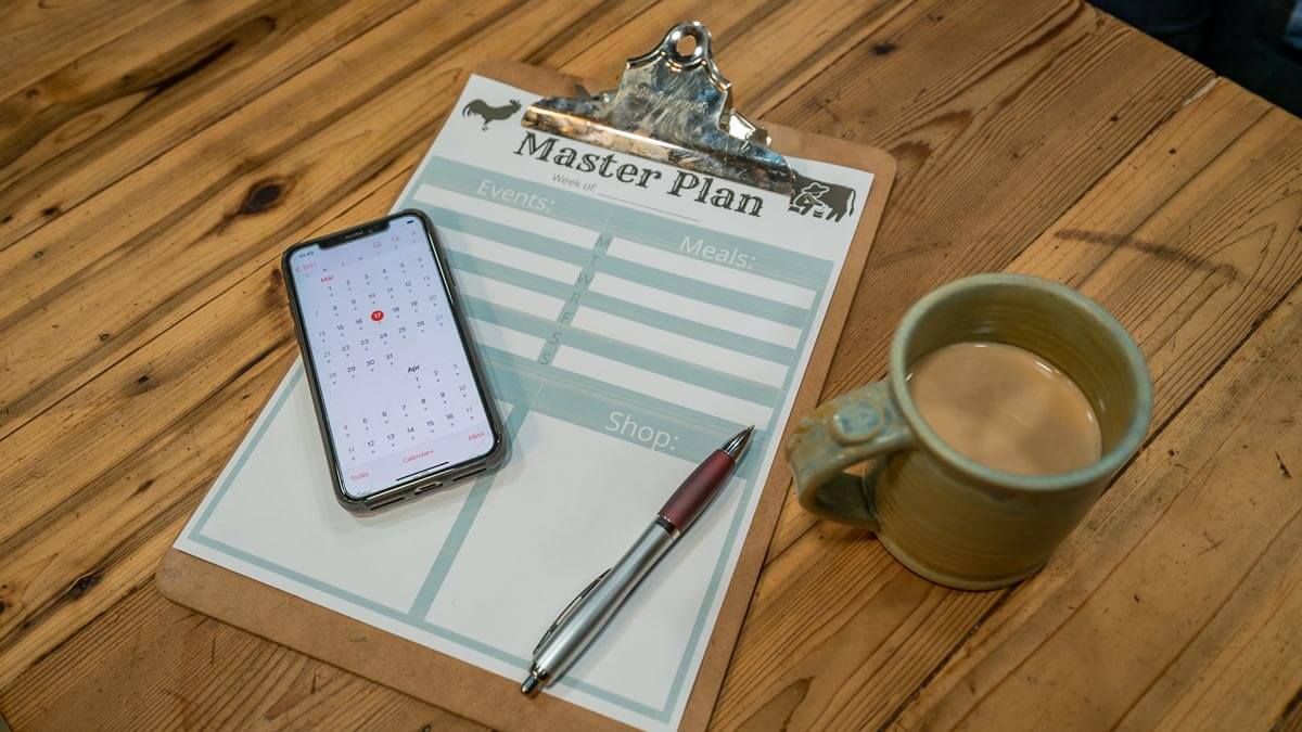 A daily schedule on a clipboard.