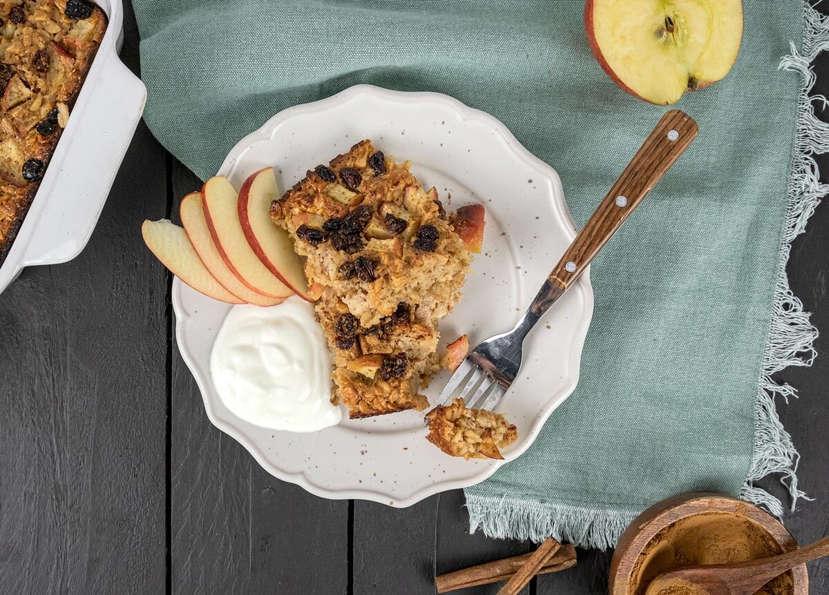 Baked oatmeal on a plate with a fork.