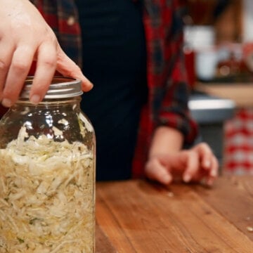 A jar of garlic dill sauerkraut.