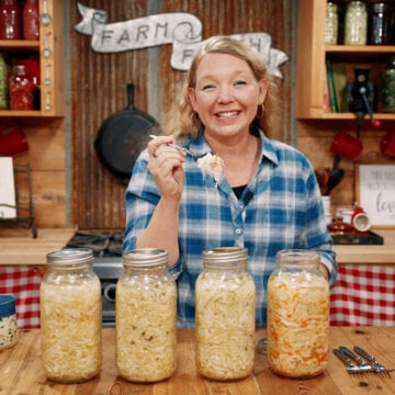 A woman with four different sauerkraut recipes.