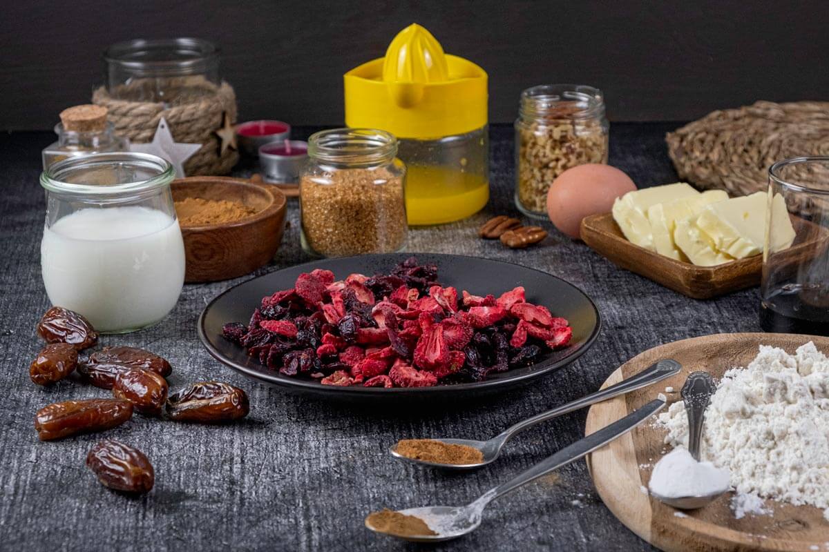 Ingredients laid out on a counter to make fruitcake cookies.