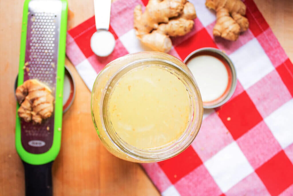 Overhead view of a jar with a Ginger Bug inside.