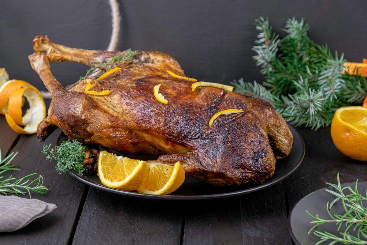 Roast goose on a serving platter.