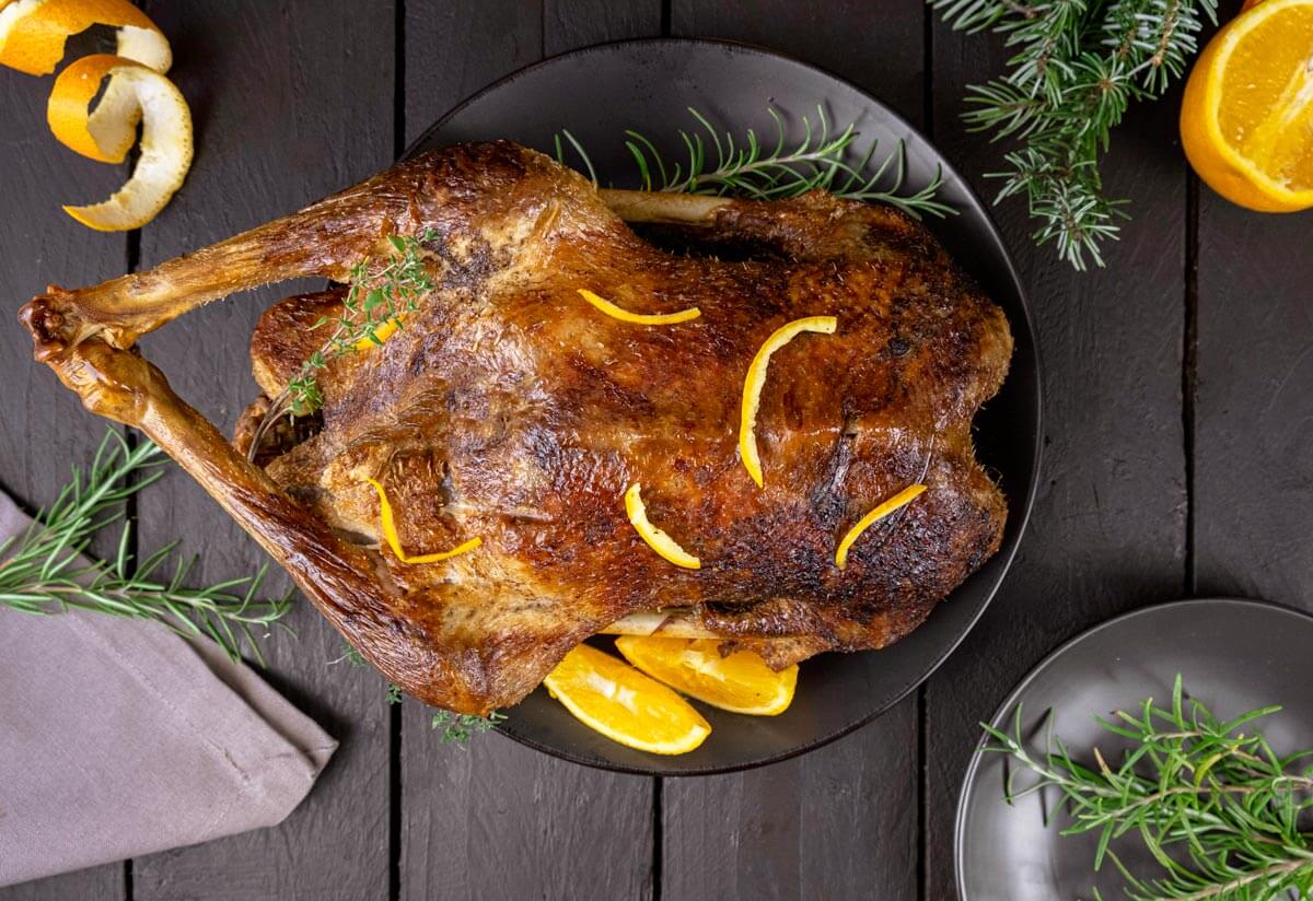 Roast goose on a serving platter.