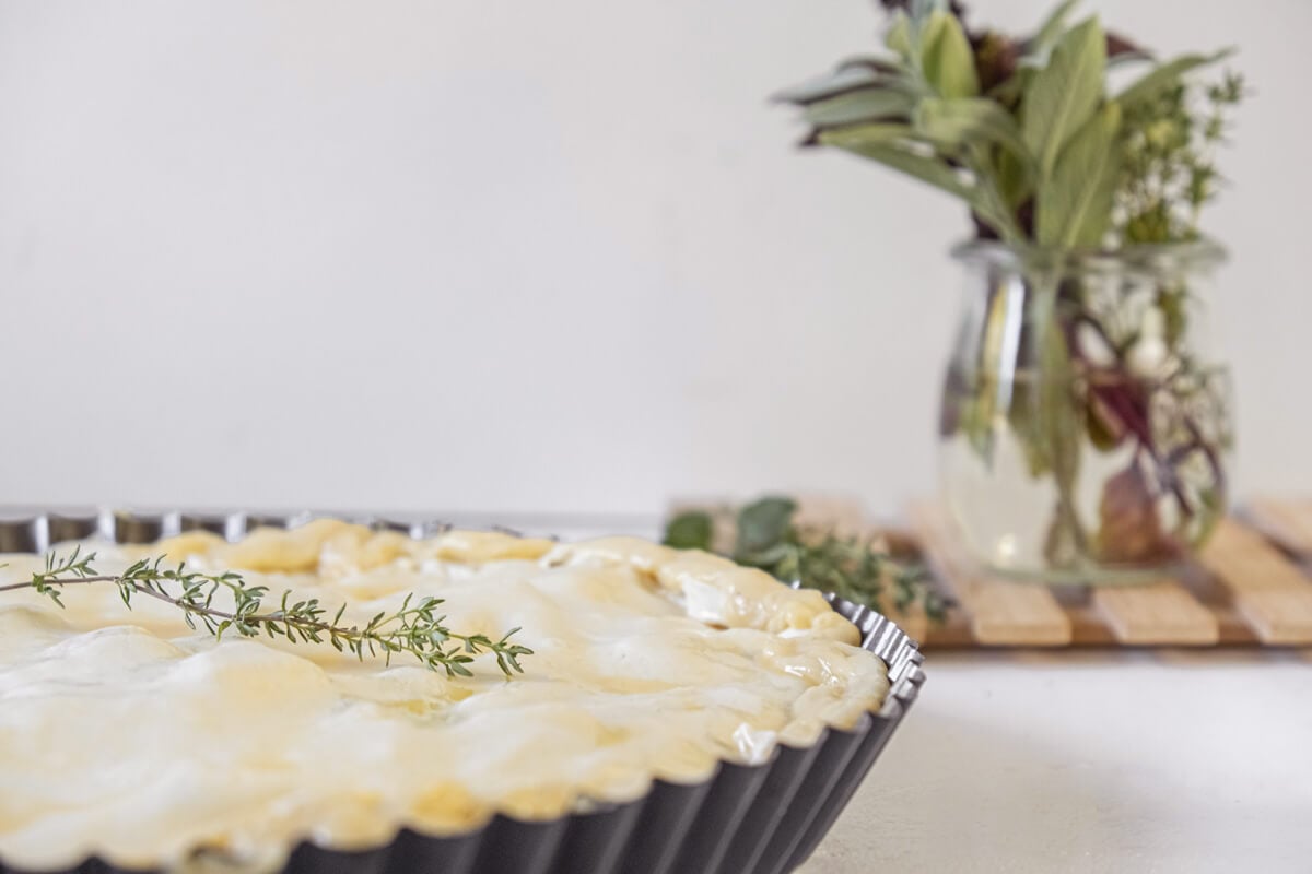 An unbaked beef pot pie ready to bake.
