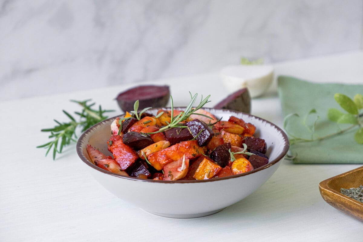 Roasted root vegetables in a bowl.