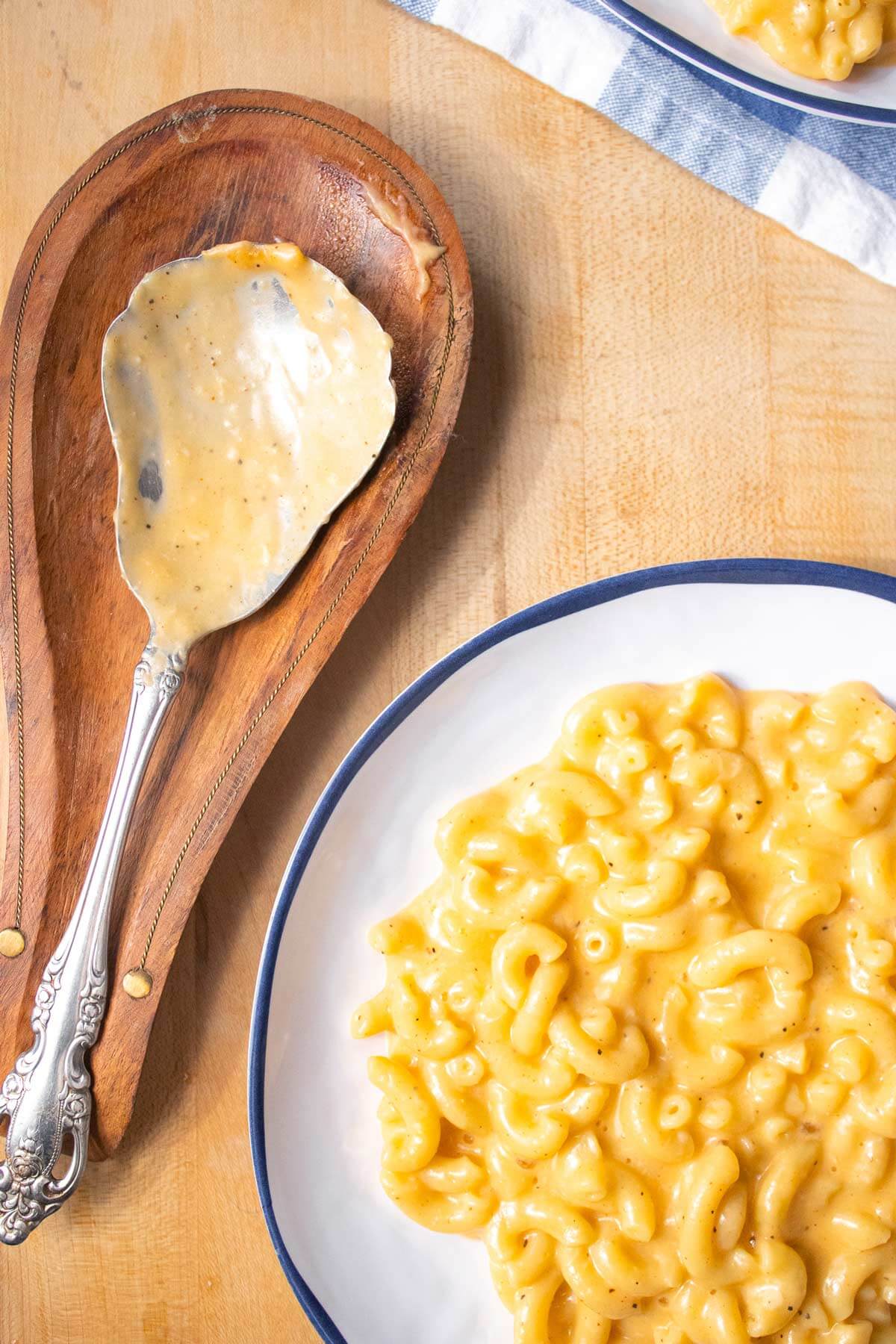 Photo of Instant Pot macaroni and cheese in a white bowl.