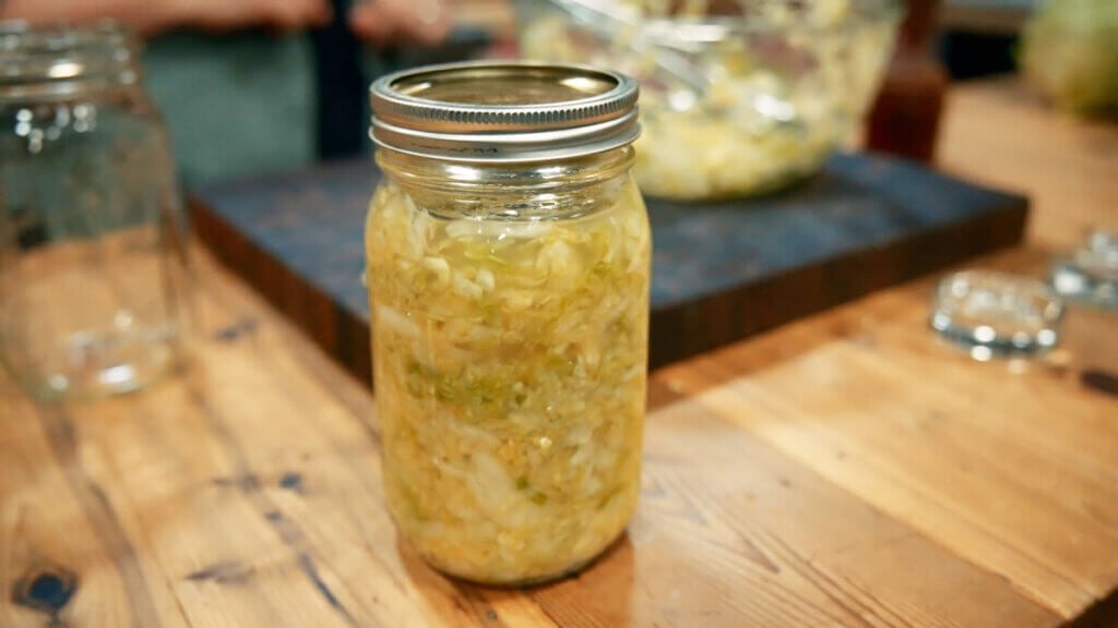 A jar of sauerkraut.