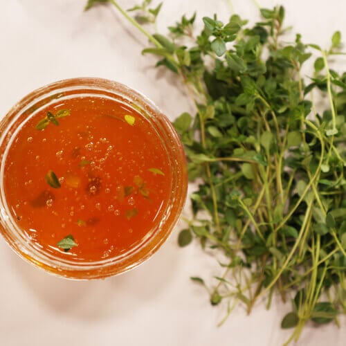 Herbal honey and fresh herbs.