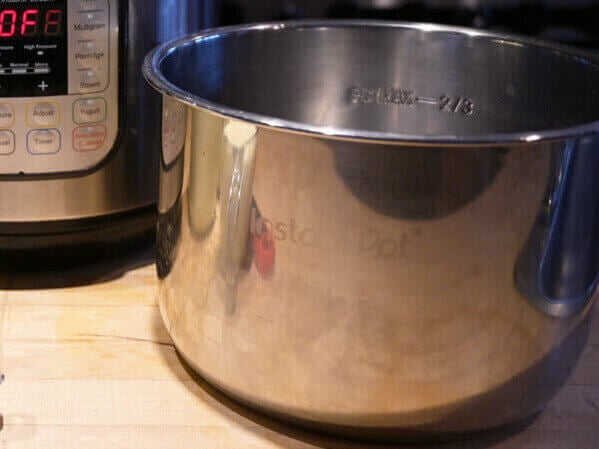 Instant Pot yogurt ingredients on a kitchen counter.