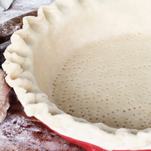 Pie crust in a pie pan.