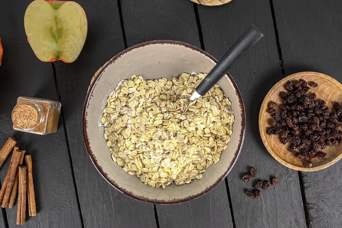 Oats in a large bowl to make an oatmeal bake.