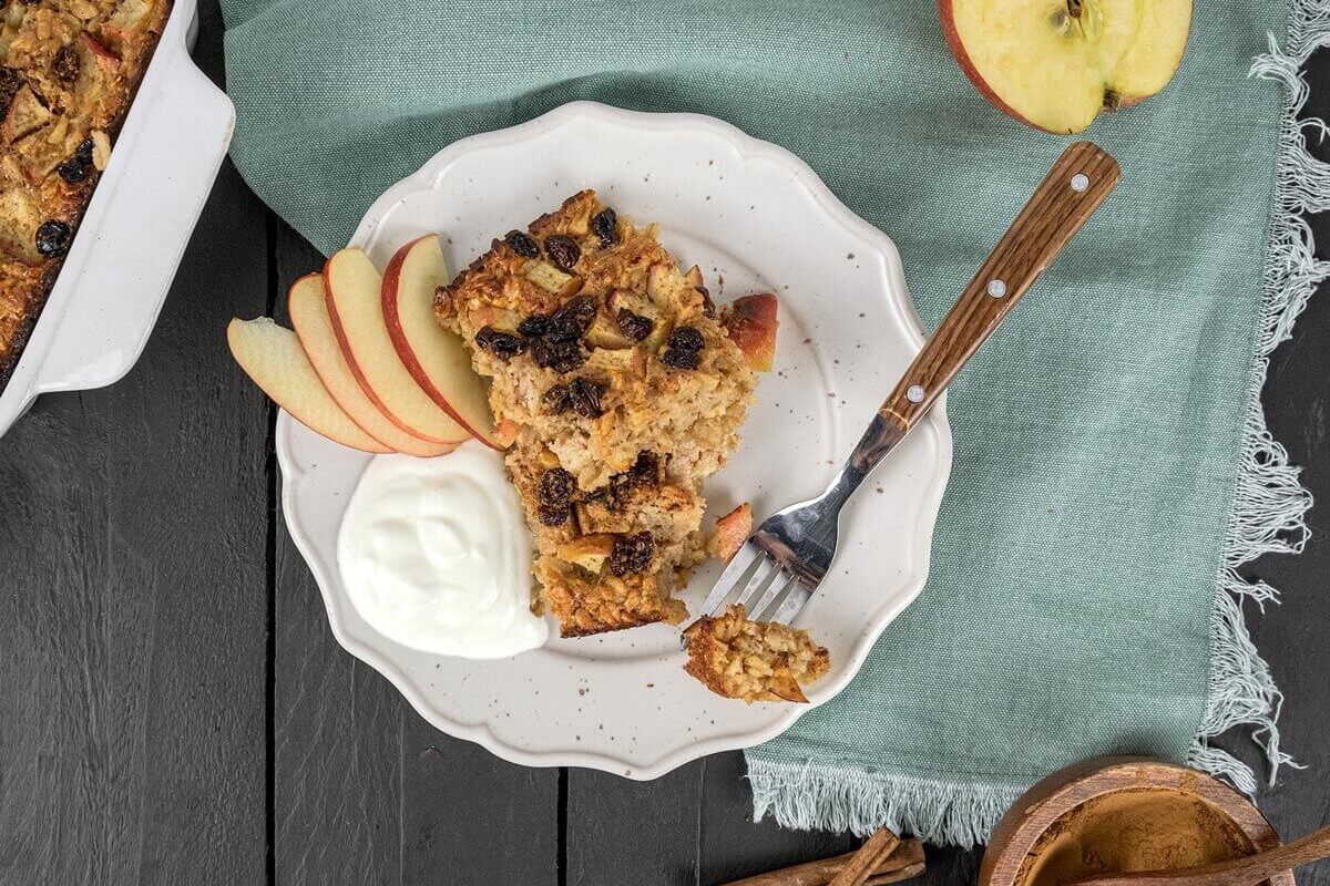 Baked oatmeal on a plate with a fork.