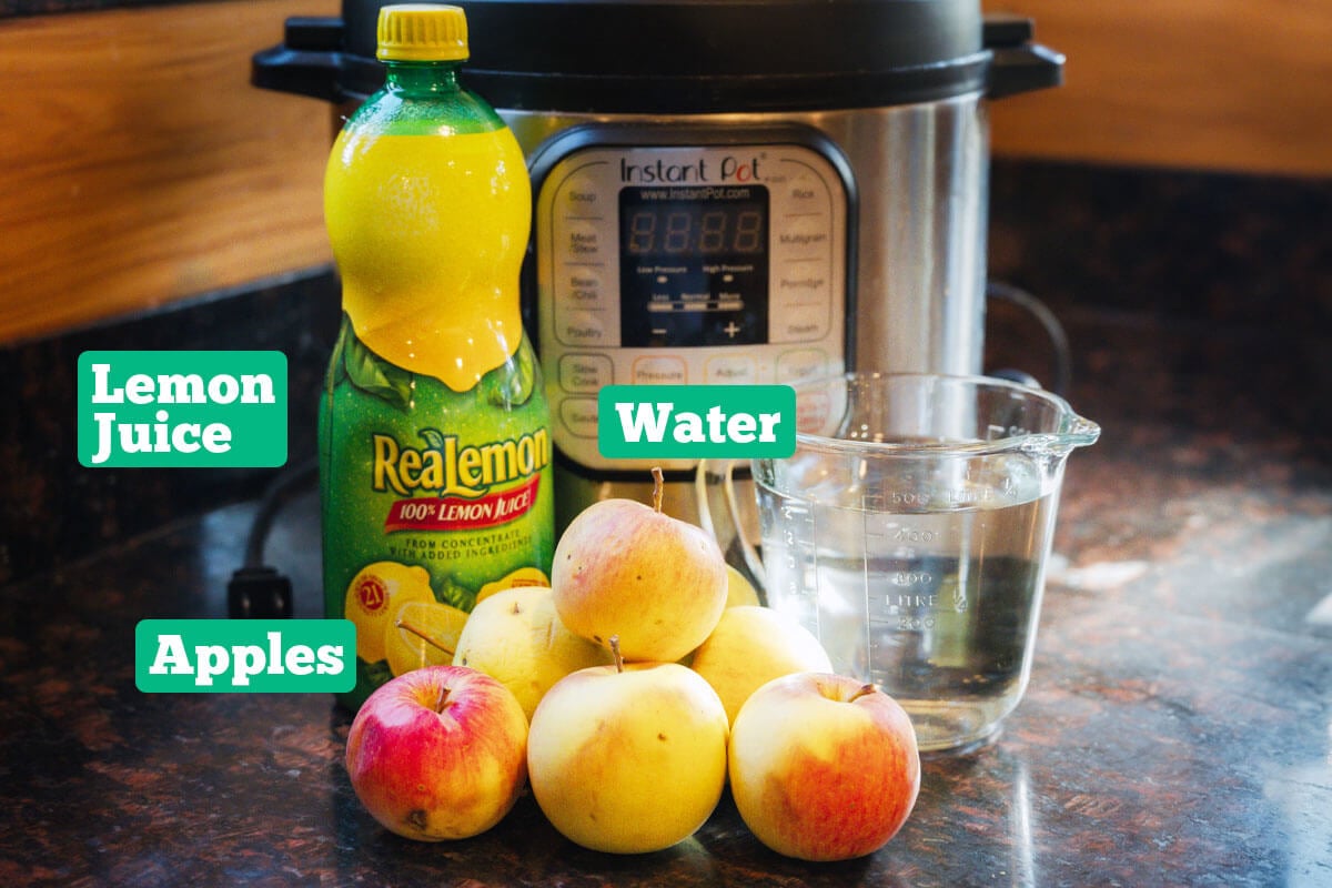 Instant Pot applesauce ingredients: lemon juice, apples, and water.