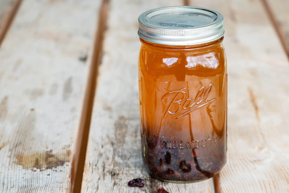 A sealed jar of kombucha going through the second ferment process.