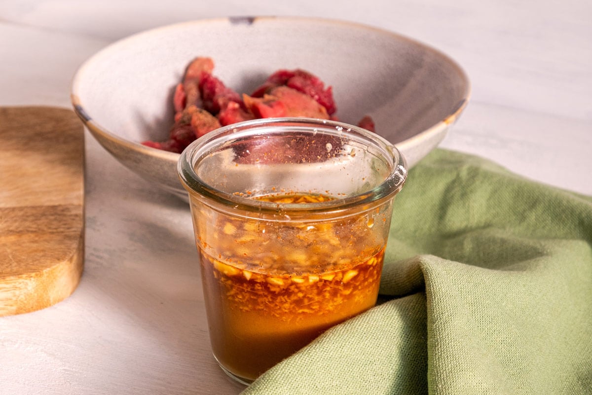 A jar full of freshly made stir fry sauce.