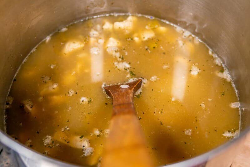 Large stockpot filled with chicken chili.