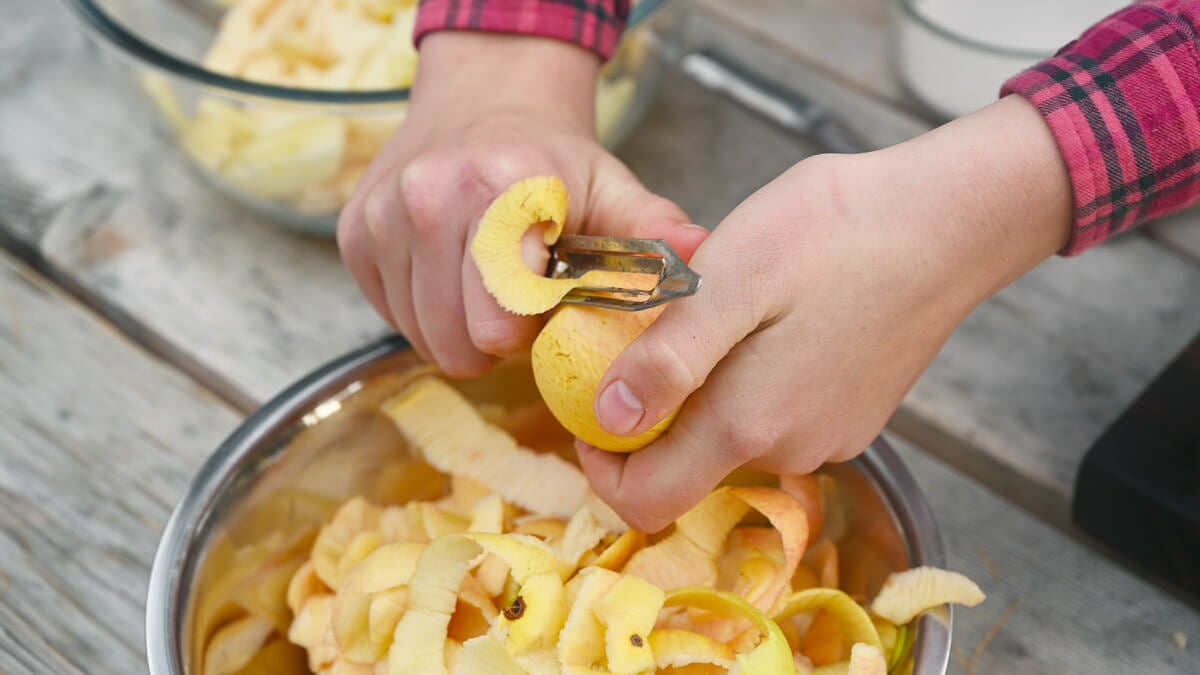 Apples being peeled.