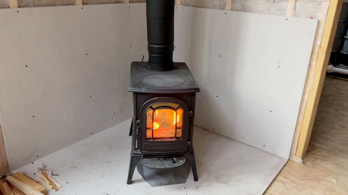 A small woodstove inside a cabin.