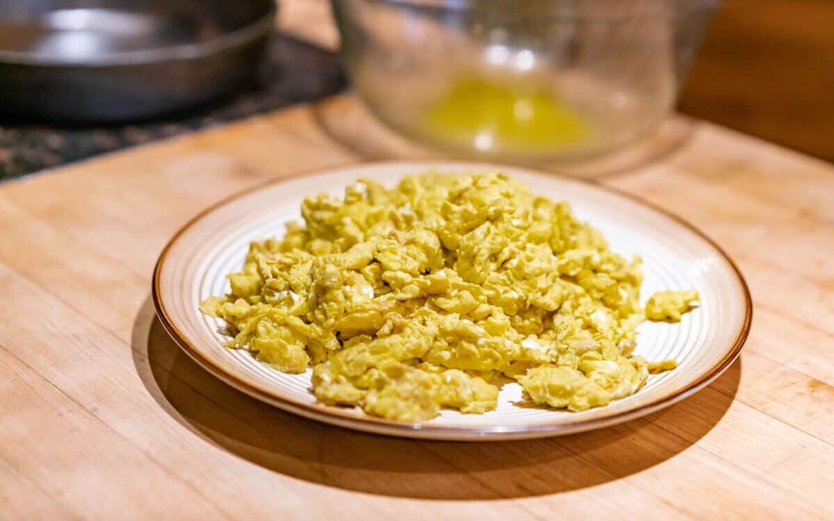 Scrambled eggs on a plate.