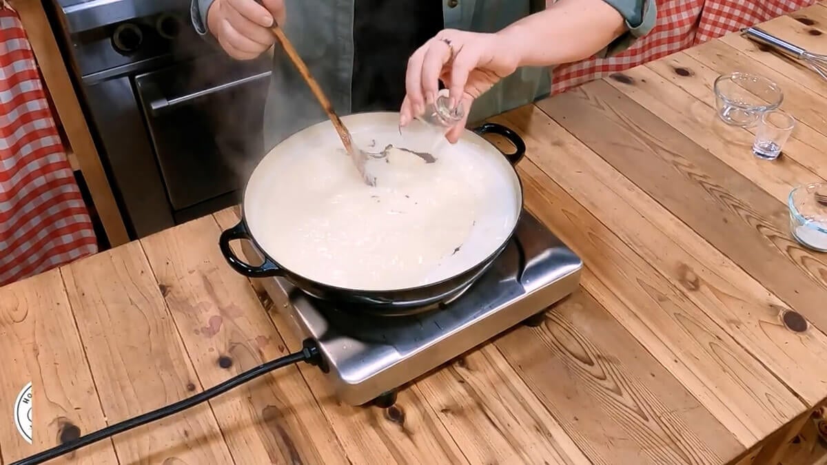 Adding seasonings to cream of chicken soup.