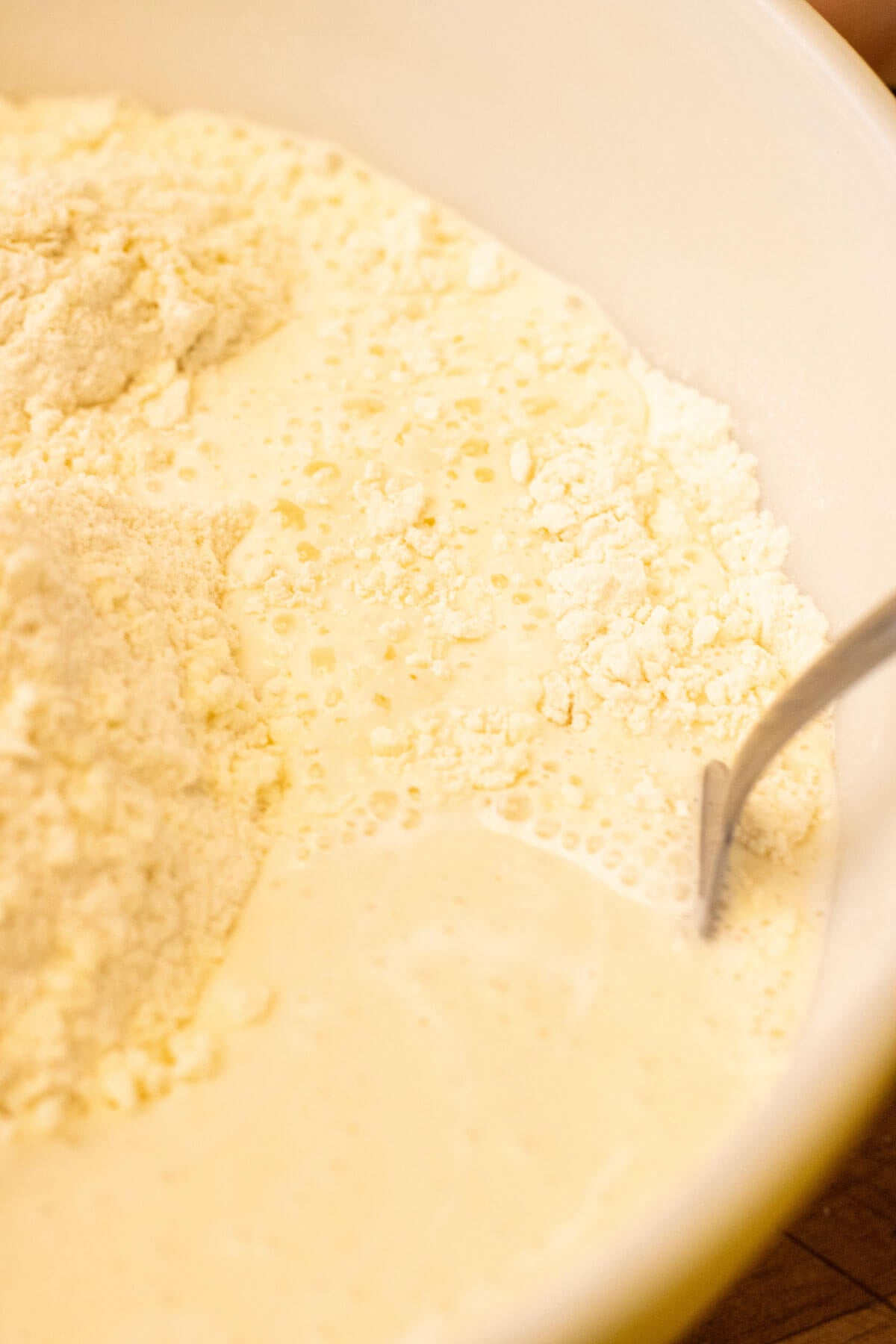 Sourdough discard tortilla ingredients mixed in a bowl.