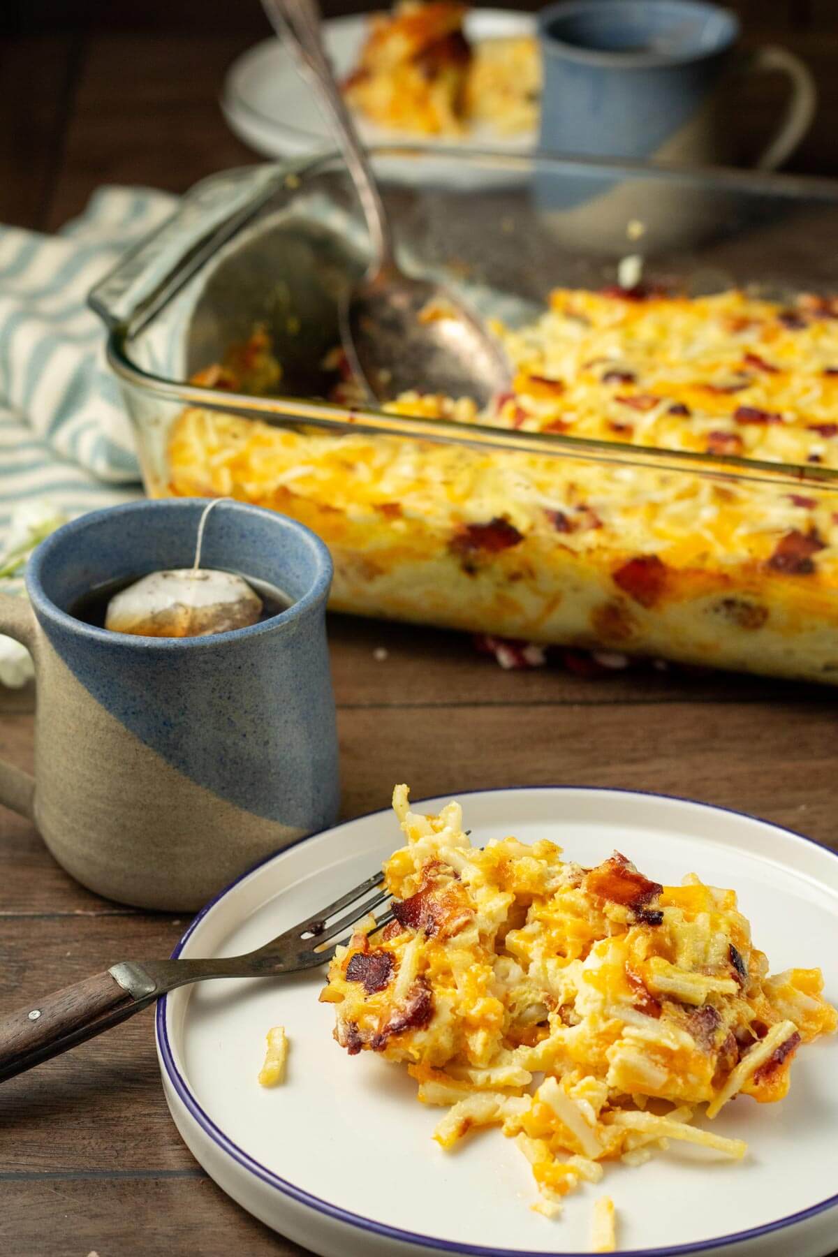 A serving of Amish breakfast casserole on a white plate.