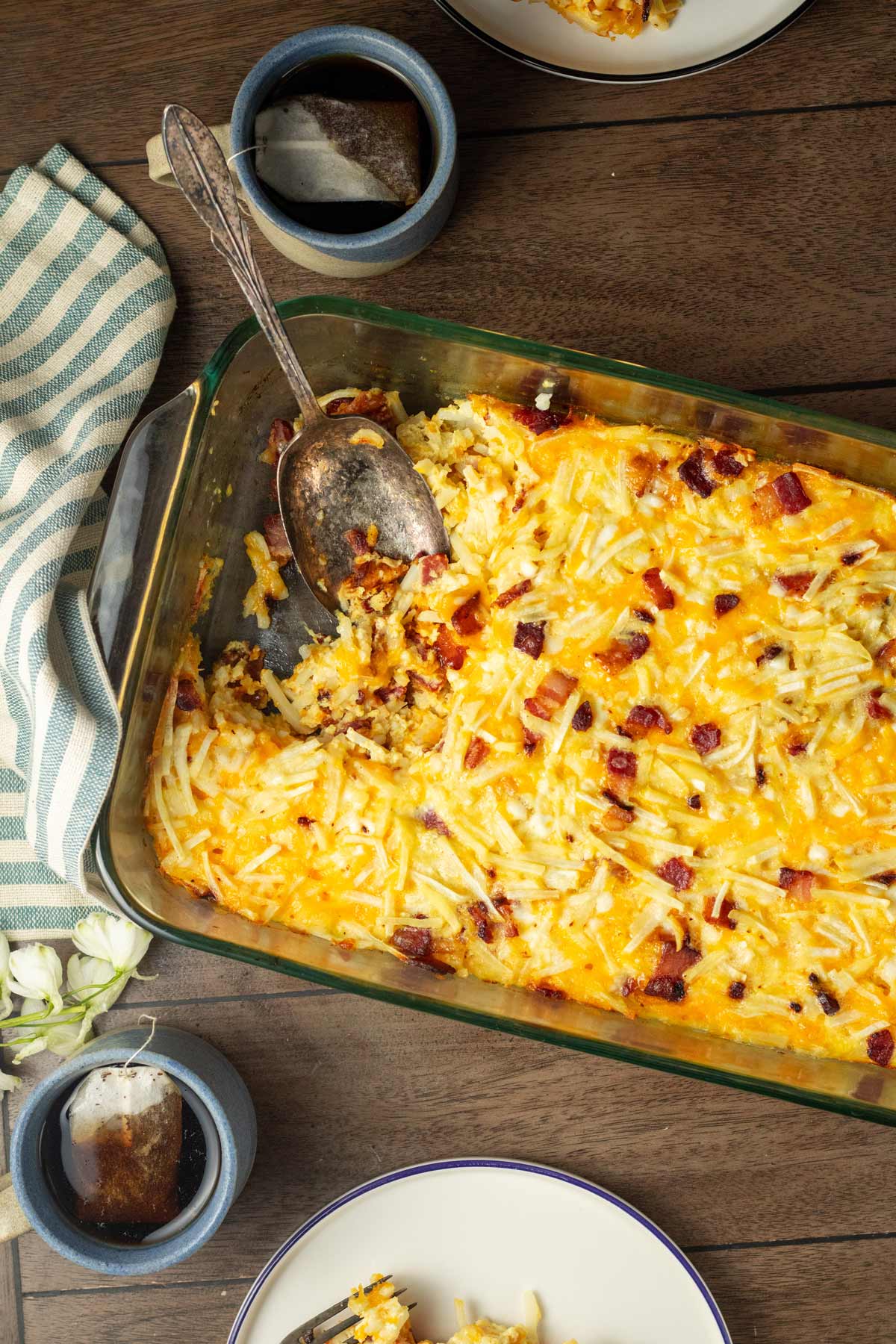 Bird's eye view of a baked Amish breakfast casserole in a glass baking dish.