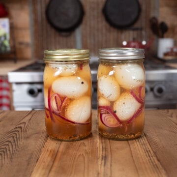 Two jars of homemade pickled eggs.