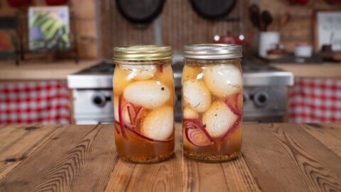 Two jars of homemade pickled eggs.