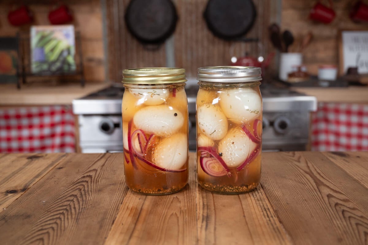 Two jars of homemade pickled eggs.