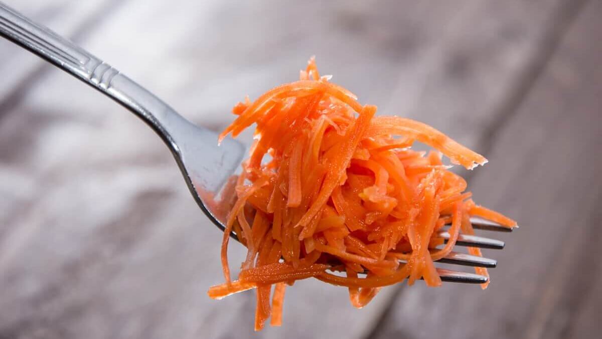 Fermented carrots on a fork.