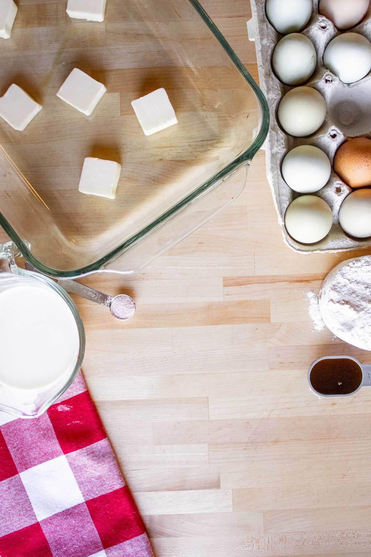 Butter slices in a baking dish.