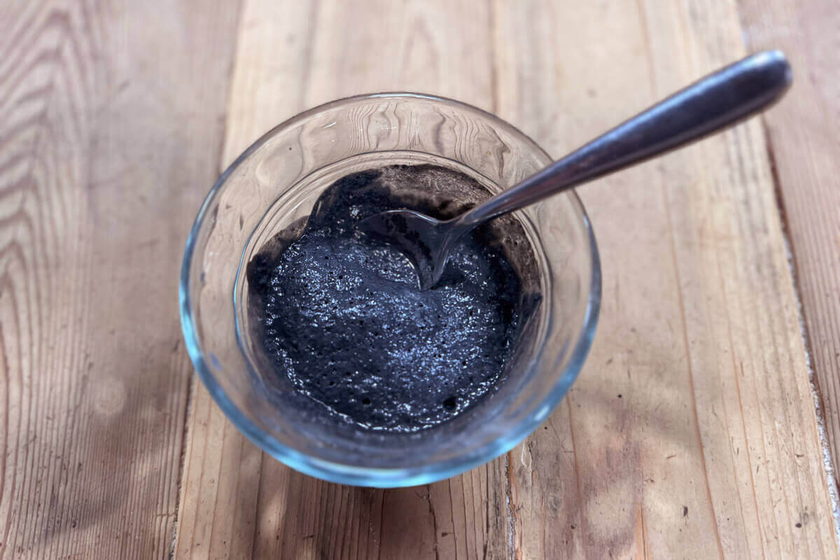A clay mask mixed up in a bowl.