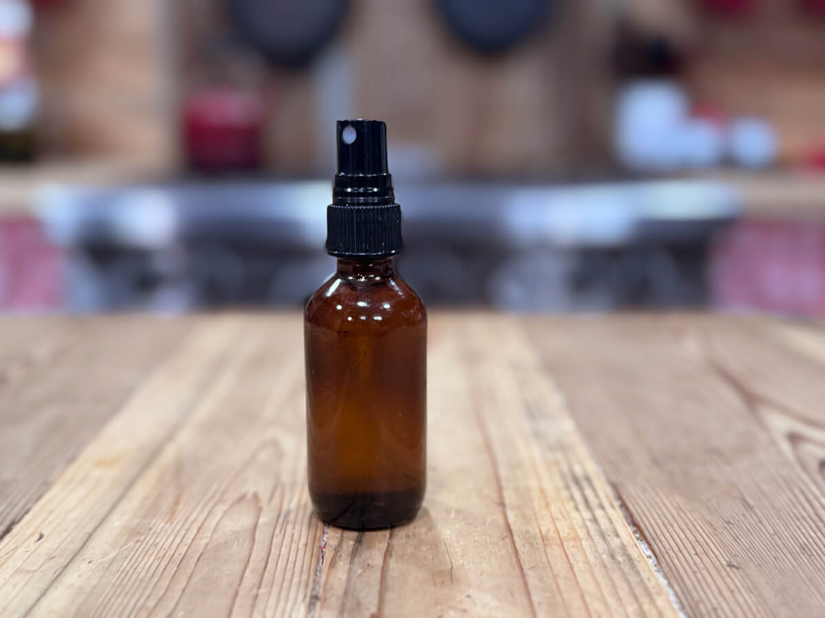 A bottle of magnesium deodorant spray.