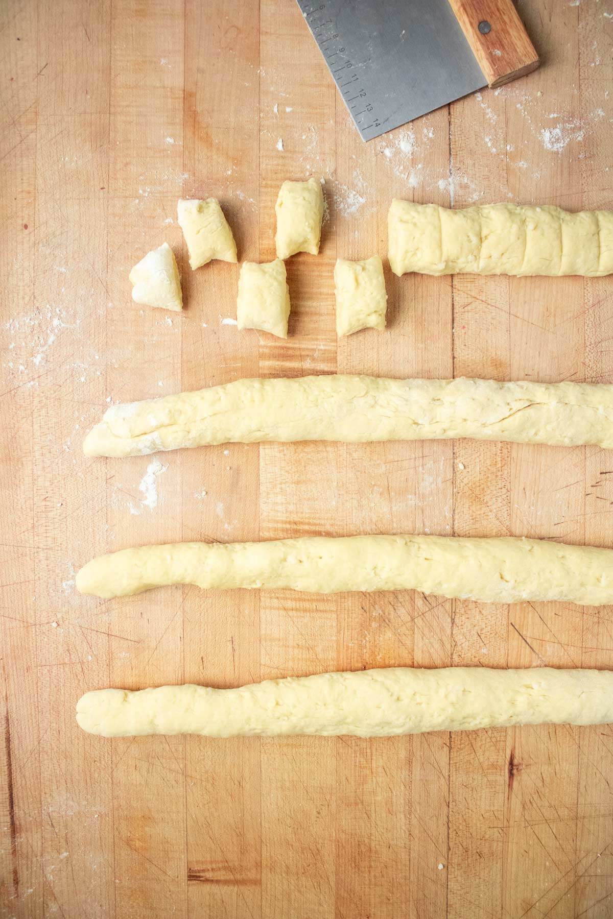 Homemade gnocchi dough rolled and ready to cut.